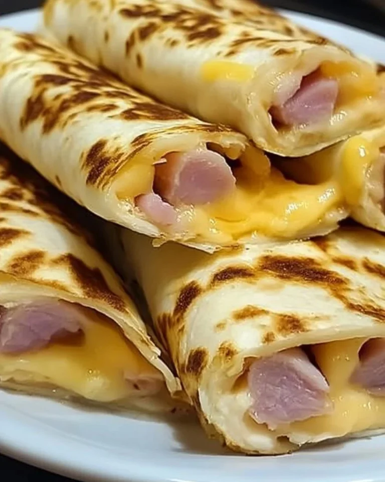 Air Fryer Chicken Ham & Cheese Wraps with crispy chicken in a tortilla