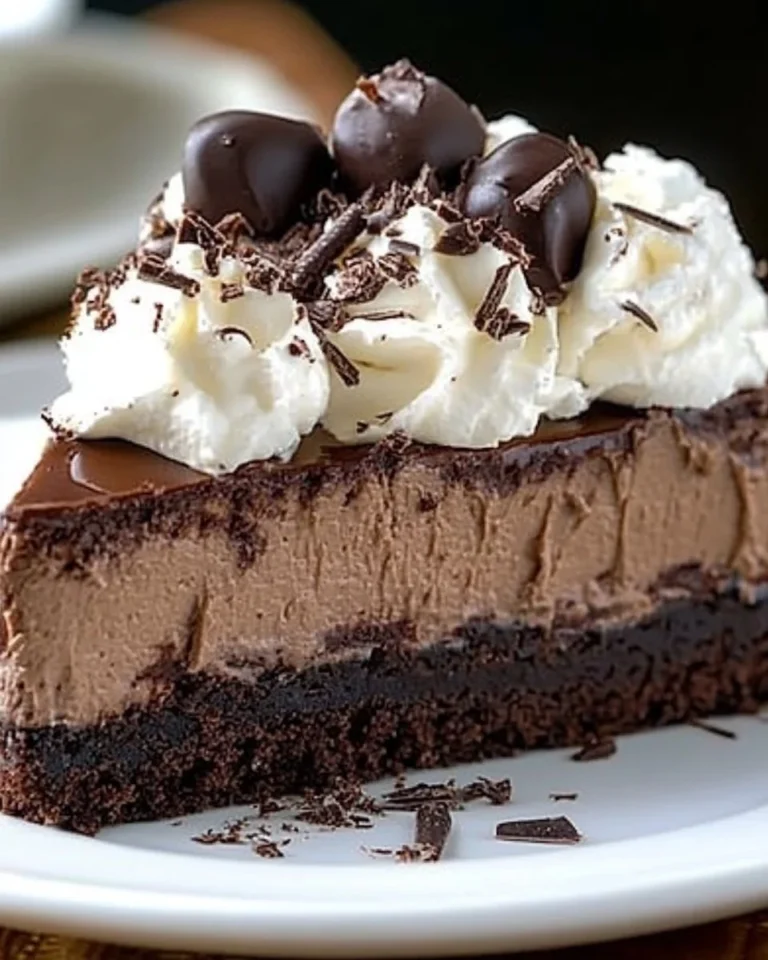 Delicious Brownie Cheesecake with rich chocolate layers and creamy topping.