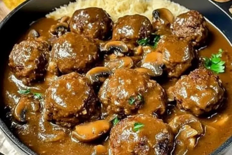 Delicious meatballs in creamy mushroom gravy served on a plate