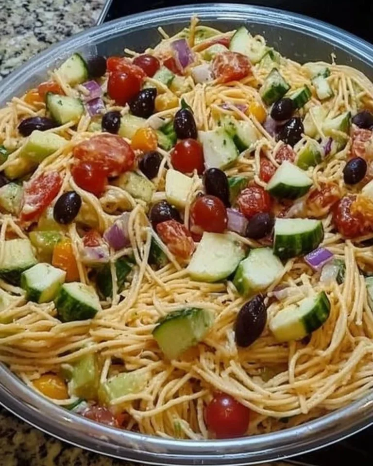 Delicious spaghetti salad with fresh vegetables and dressing