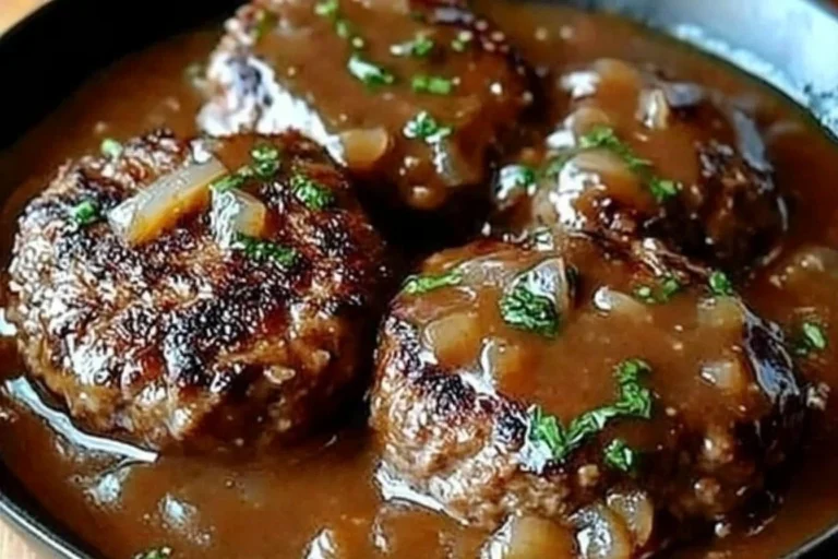 Delicious homemade Salisbury Steak served with gravy and mashed potatoes