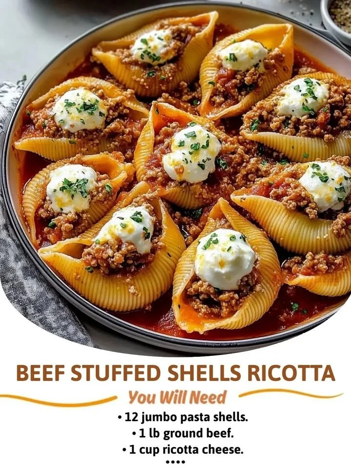 Delicious beef stuffed shells topped with marinara sauce and cheese