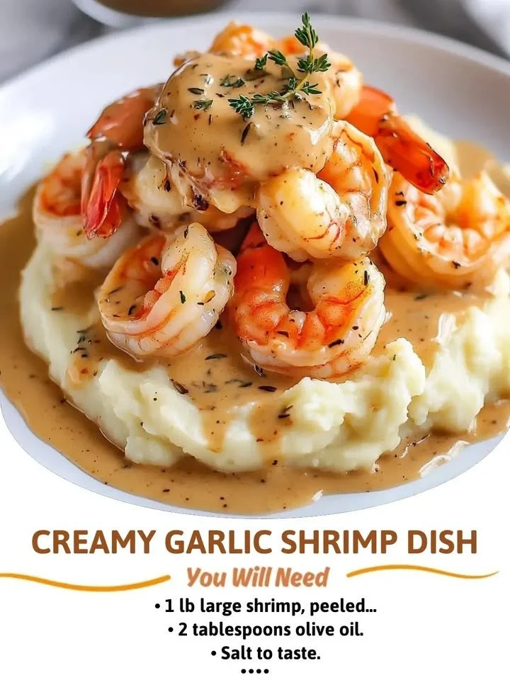 Creamy garlic shrimp dish garnished with parsley on a plate