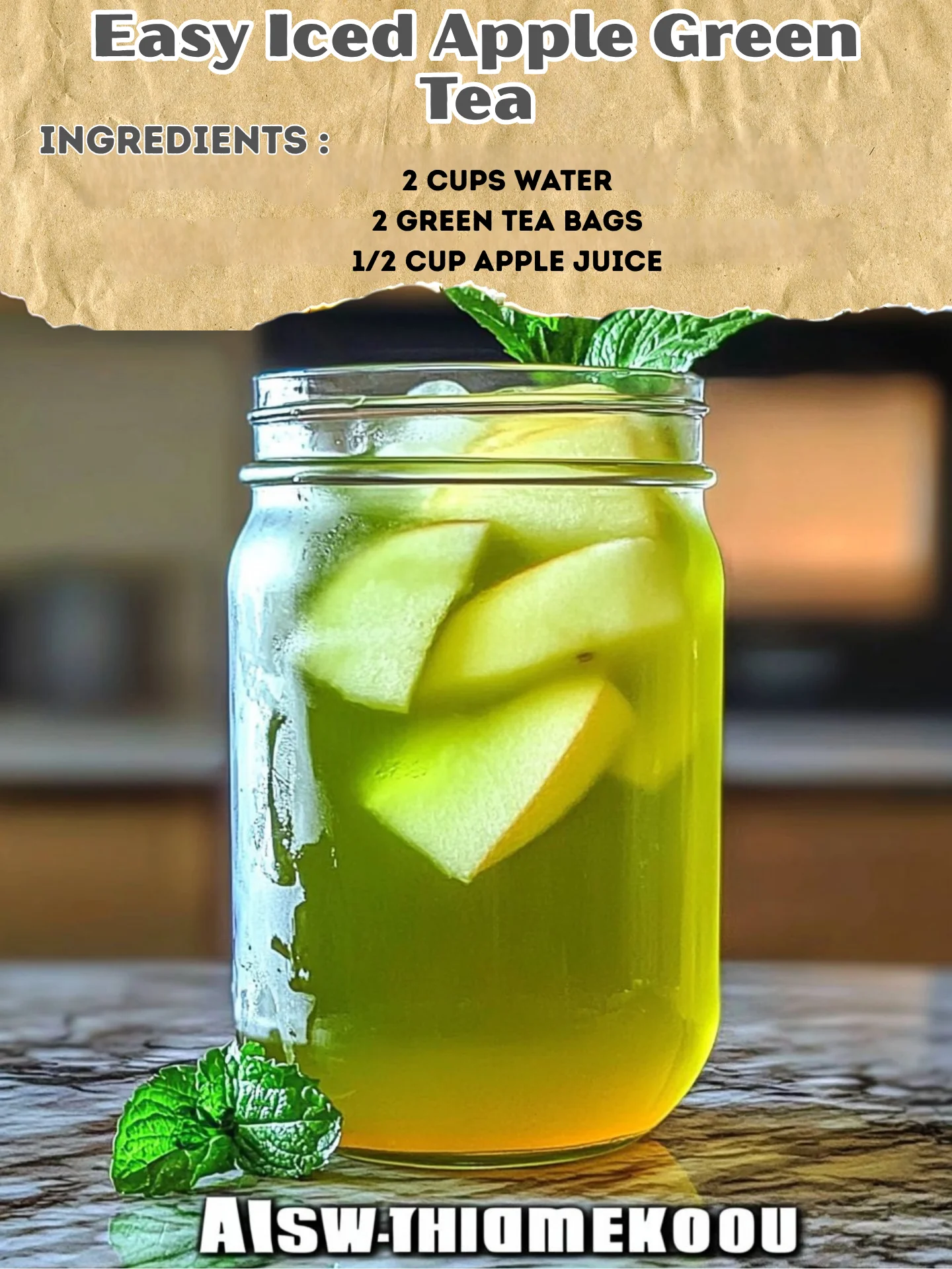A refreshing glass of iced apple green tea with apple slices and mint leaves.