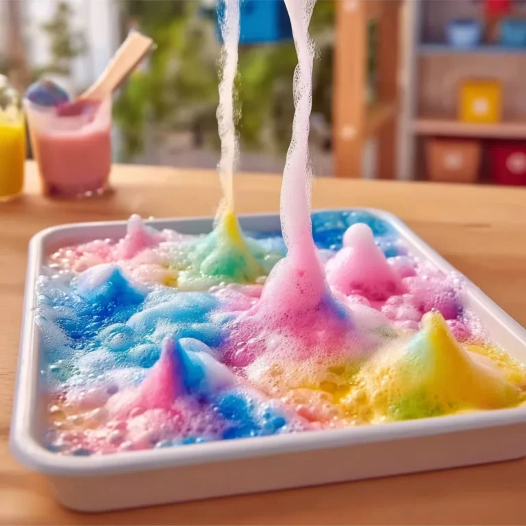 Children enjoying fizzy painting activity with vibrant colors and creative expressions.