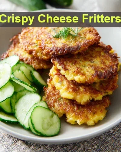 Delicious crispy cheese fritters served on a plate.